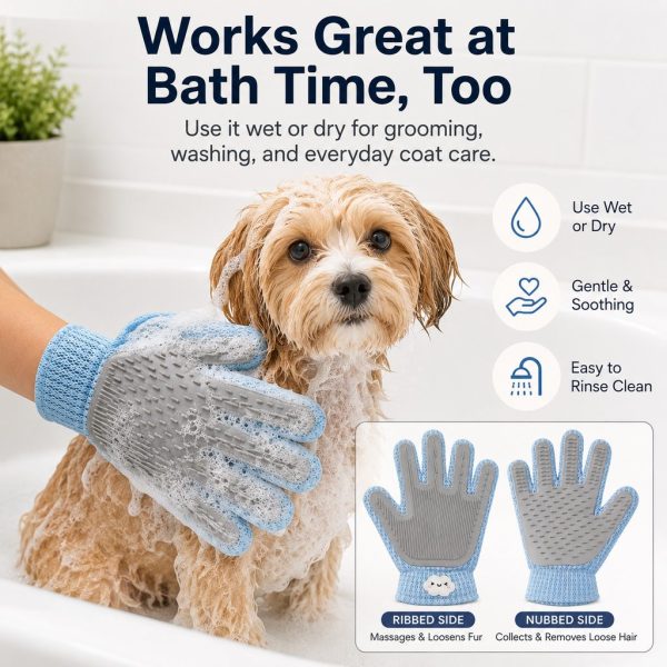 Blue dual sided pet grooming glove used on a wet dog during bath time.