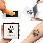 Clean touch pet paw print ink pad demonstration with a paw print, framed keepsake and matching tattoo example.