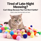 Cat resting near the colorful plush cat toy balls during quiet indoor play