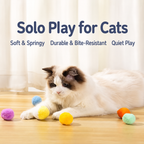 Cat batting the colorful plush cat toy balls during solo play