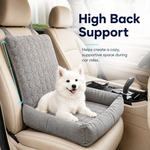 Gray corduroy dog car seat bed with arrows highlighting the tall backrest behind a white dog.