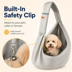 Gray crossbody pet sling carrier closeup of the interior tether attachment beside a dog.