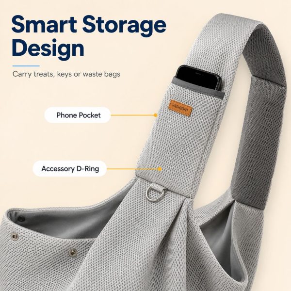 Gray crossbody pet sling carrier showing the phone pocket and accessory ring on the strap.