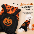 Halloween dog jumpsuit showing the black suspender design and pumpkin emblem.
