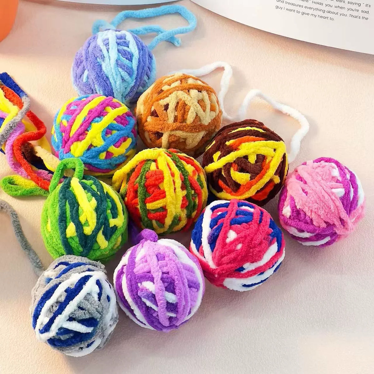 Close view of grouped mixed-color cat ball toys