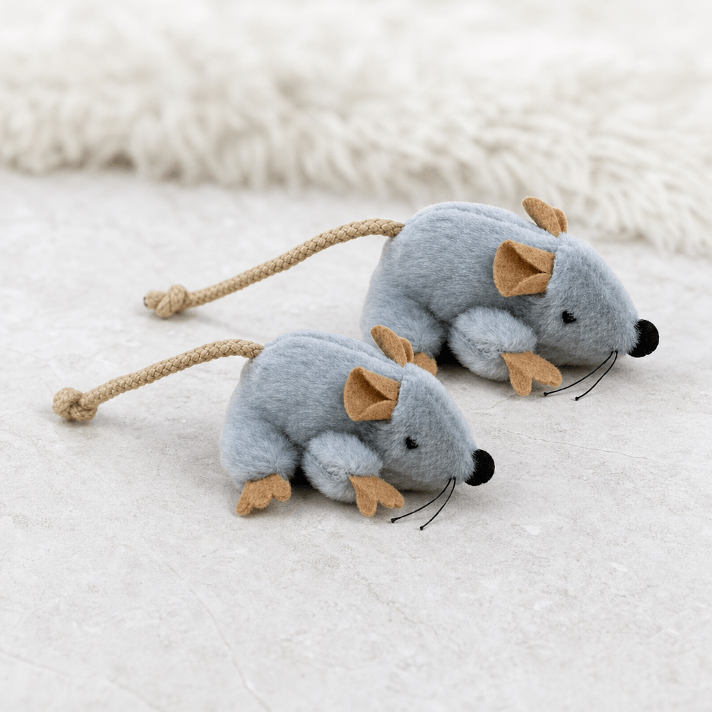 Two moving plush mouse cat toy pieces arranged together