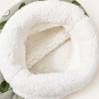 Close view of the interior on the plush cat cave bed