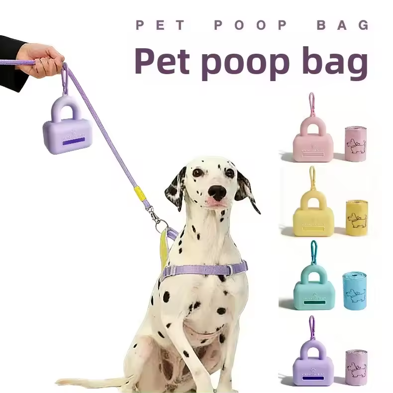 Silicone dog waste bag dispenser clipped onto a dog leash