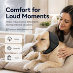 Soft dog ear cover in dark gray worn by a dog resting beside its owner.