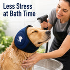 Soft dog ear muffs in navy worn by a dog during bathing and blow drying.